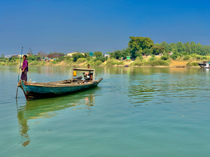 Standing in Front of the Boat