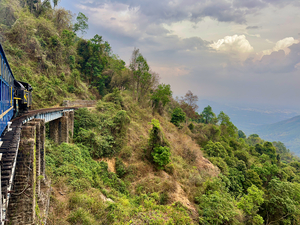 Toy Train by the Mountain
