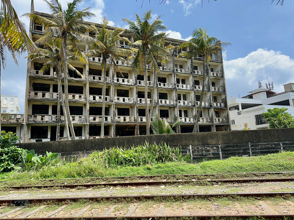 Abandoned Building with Palm Trees Print