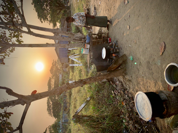 Cooking outside in Myanmar at Sunset  Print