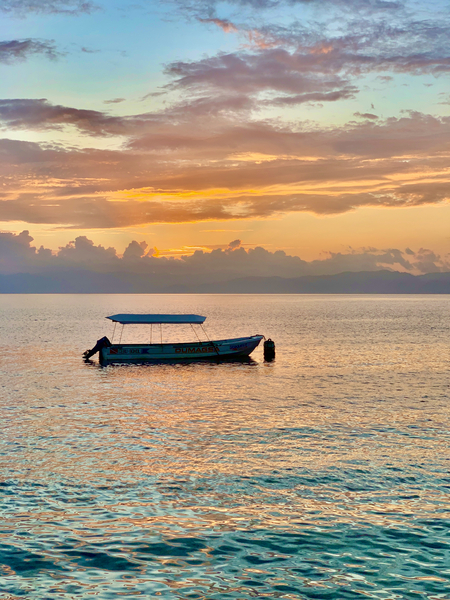 Lonely Boat at Sunset Print