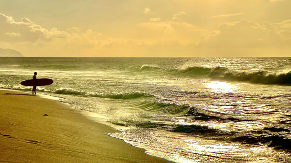 Surfer on the Beach at Sunset Print