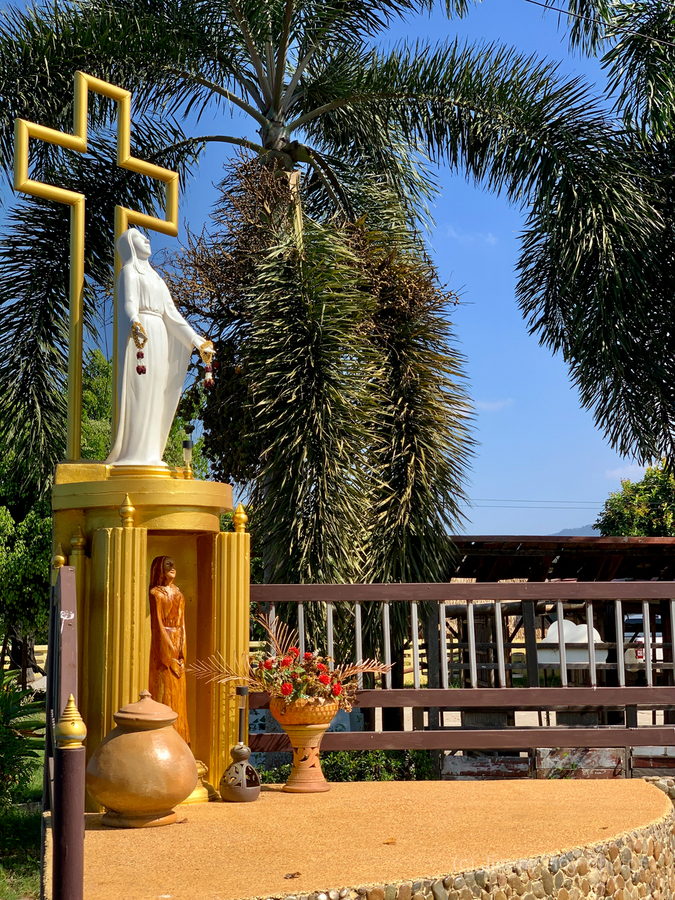 Mary’s Statue in front of the Cross  Print