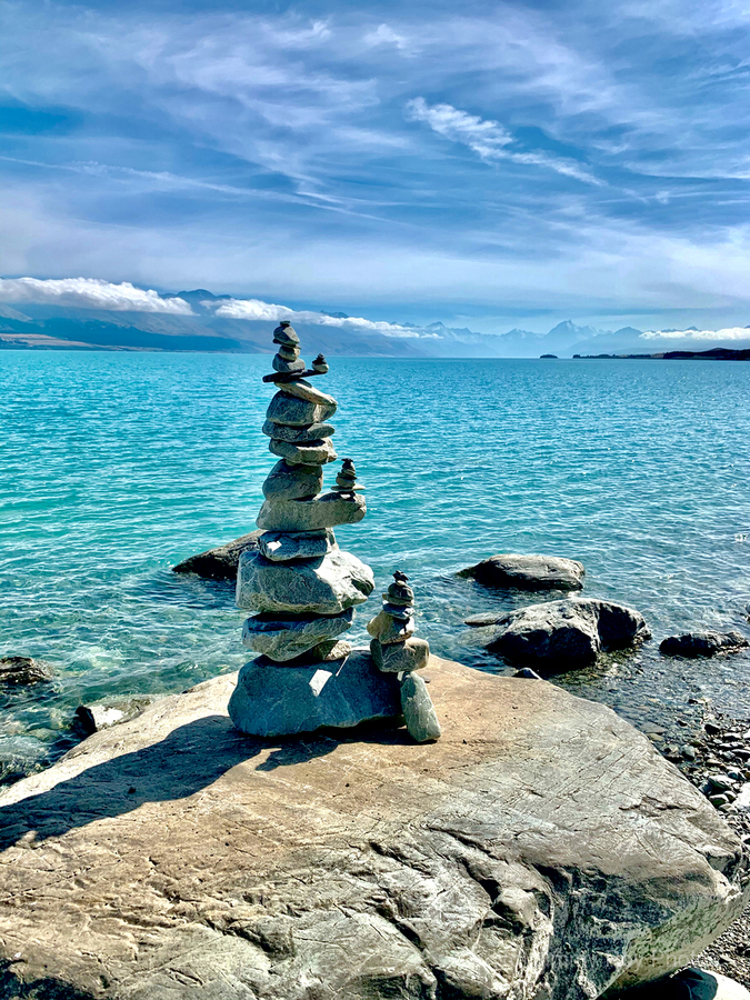 Rock Balancing in Front of the Lake  Print
