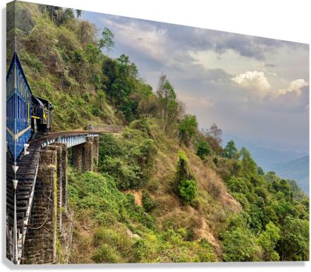Toy Train by the Mountain Canvas Print