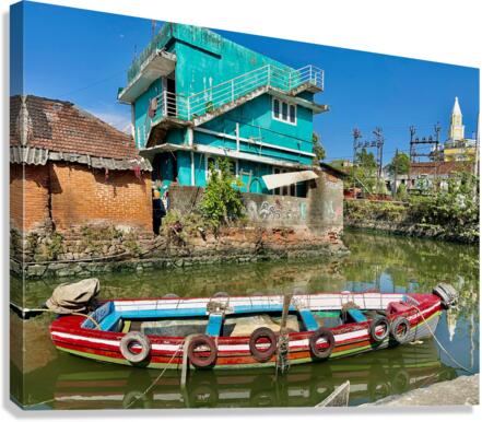 Colourful Boat on the Water Canvas Print
