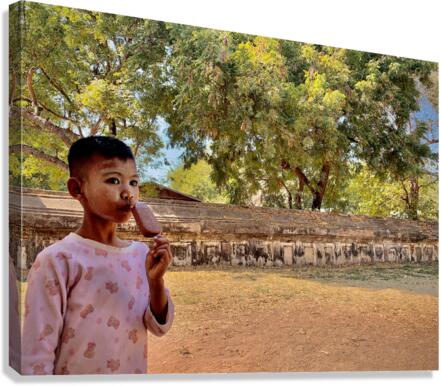 Myanmar Boy Eating a Frozen Candy Bar Canvas Print