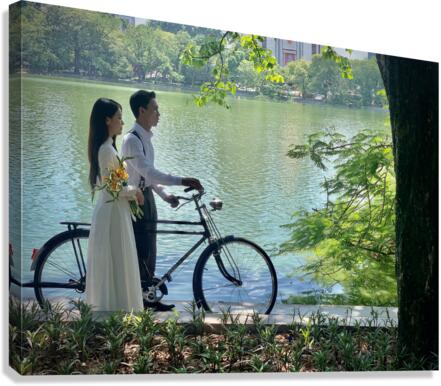 Newlyweds by the Lake with a Bicycle Canvas Print