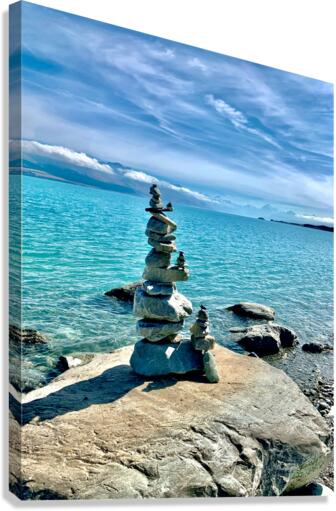 Rock Balancing in Front of the Lake Canvas Print