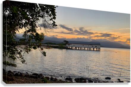 Long Building on Water during Sunset Canvas Print