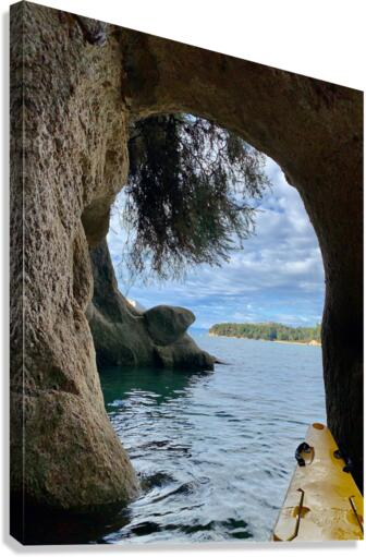 Kayaking Out of a Cave Canvas Print