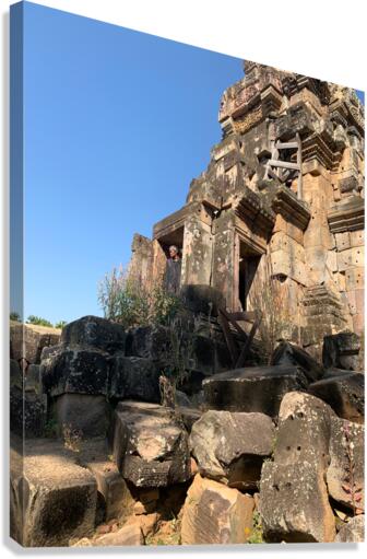 Man Looking Outside of Old Temple Canvas Print