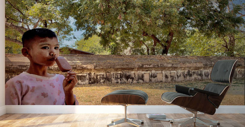 Myanmar Boy Eating a Frozen Candy Bar Wall Murals