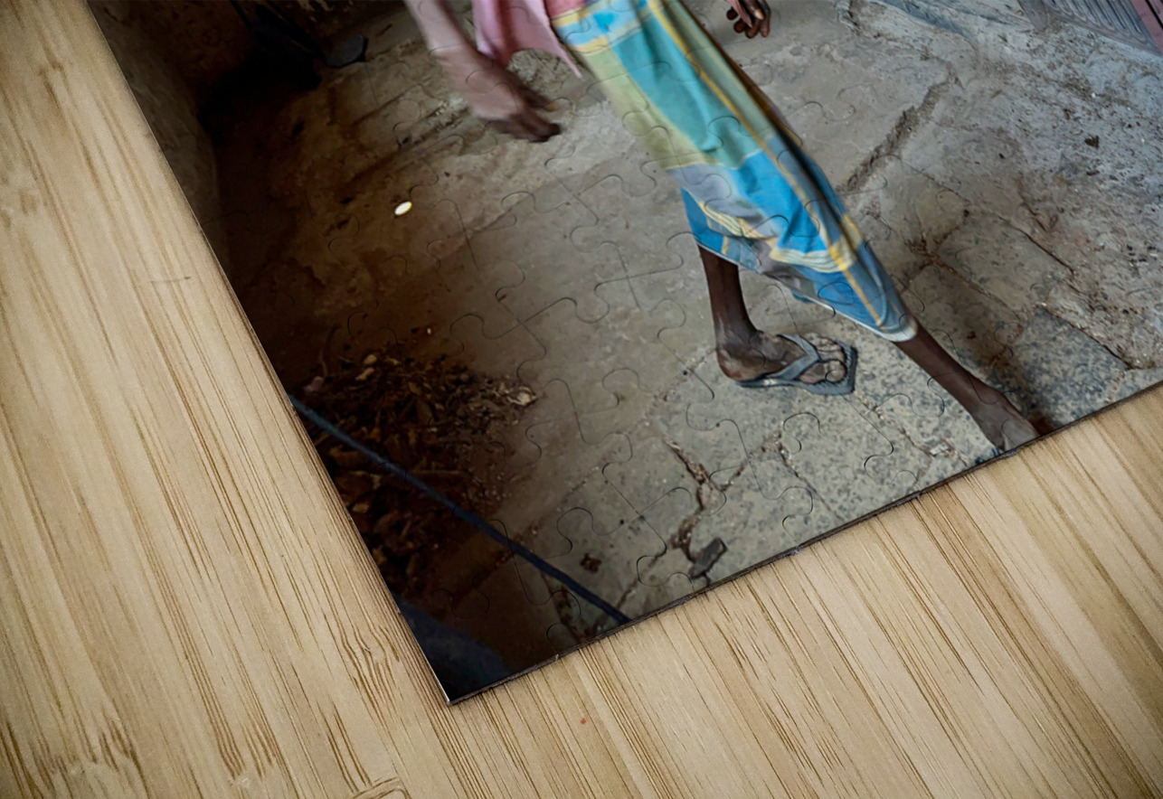 Man Fuelling Up the Fire Jimmy Roy Photos Puzzle